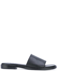 Черные кожаные сандалии на плоской подошве от DKNY