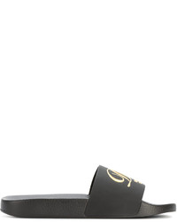 Черные кожаные сандалии на плоской подошве от Dolce & Gabbana