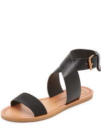 Черные кожаные сандалии на плоской подошве от Dolce Vita