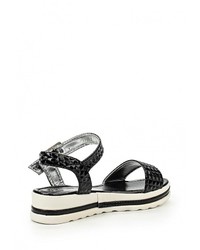 Черные кожаные сандалии на плоской подошве от Donna Moda