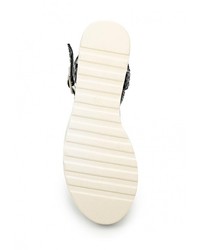 Черные кожаные сандалии на плоской подошве от Donna Moda