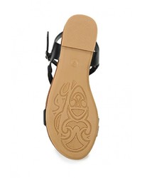 Черные кожаные сандалии на плоской подошве от Flyfor