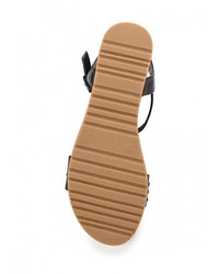 Черные кожаные сандалии на плоской подошве от Flyfor