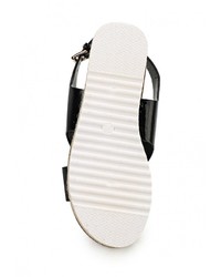 Черные кожаные сандалии на плоской подошве от Ideal