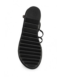 Черные кожаные сандалии на плоской подошве от Lola Cruz