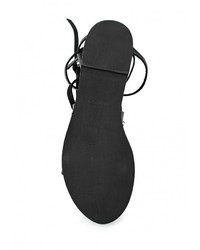 Черные кожаные сандалии на плоской подошве от Mango