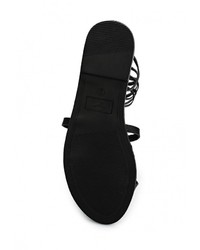 Черные кожаные сандалии на плоской подошве от Spurr