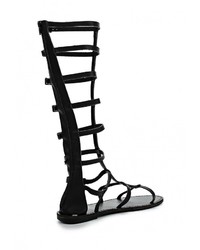 Черные кожаные сандалии на плоской подошве от Spurr