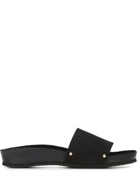 Черные кожаные сандалии на плоской подошве от Stine Goya