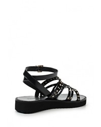 Черные кожаные сандалии на плоской подошве от Vitacci
