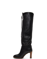 Черные кожаные сапоги от Gucci