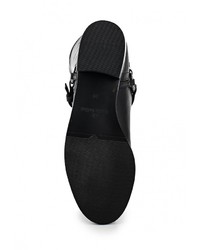 Черные кожаные сапоги от Carlo Bellini