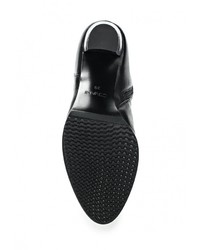 Черные кожаные сапоги от Covani