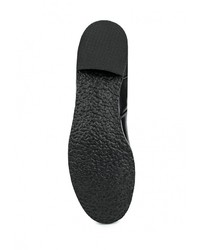 Черные кожаные сапоги от Daze