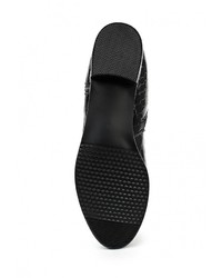 Черные кожаные сапоги от Elcherry