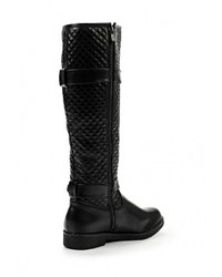 Черные кожаные сапоги от Exquily