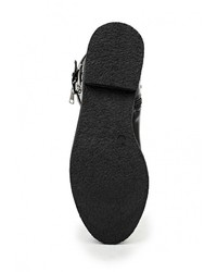 Черные кожаные сапоги от Exquily