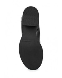 Черные кожаные сапоги от Flyfor