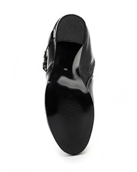 Черные кожаные сапоги от Francesco Donni