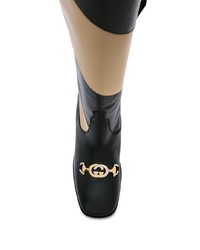 Черные кожаные сапоги от Gucci