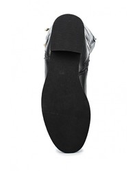 Черные кожаные сапоги от Super Mode