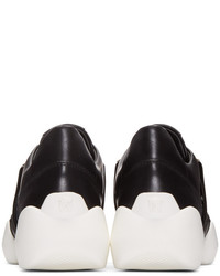 Женские черные кожаные слипоны от Versace