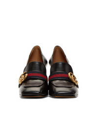 Черные кожаные туфли в горизонтальную полоску от Gucci