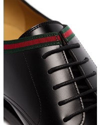 Черные кожаные туфли дерби от Gucci