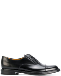 Черные кожаные туфли на шнуровке с шипами