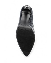 Черные кожаные туфли от Covani