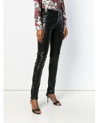 Черные кожаные узкие брюки от Saint Laurent