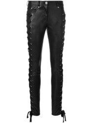 Черные кожаные узкие брюки от Versus