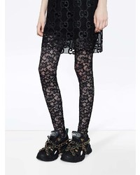 Женские черные кроссовки от Gucci