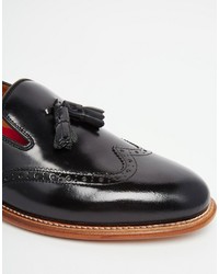 Мужские черные лоферы от Grenson