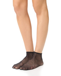 Женские черные носки в крупную сеточку от Wolford
