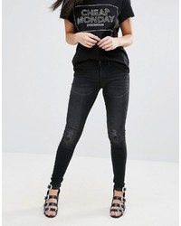 Черные рваные джинсы скинни от Cheap Monday