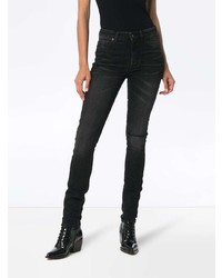 Черные рваные джинсы скинни от Saint Laurent