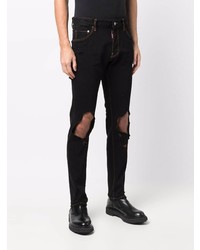 Мужские черные рваные джинсы от DSQUARED2