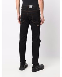 Мужские черные рваные джинсы от DSQUARED2