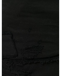Мужские черные рваные джинсы от DSQUARED2