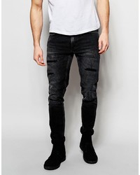 Мужские черные рваные джинсы от Nudie Jeans
