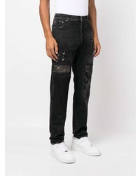 Мужские черные рваные джинсы от Palm Angels