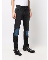 Мужские черные рваные джинсы от Just Cavalli