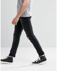 Мужские черные рваные джинсы от Religion