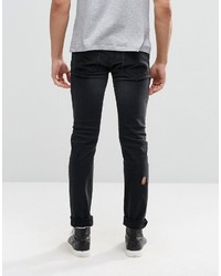 Мужские черные рваные джинсы от Religion