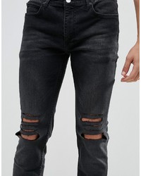 Мужские черные рваные джинсы от Religion