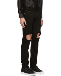 Мужские черные рваные зауженные джинсы от Christian Dada