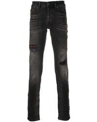 Мужские черные рваные зауженные джинсы от Diesel