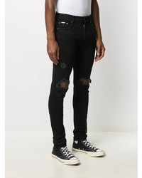 Мужские черные рваные зауженные джинсы от Represent