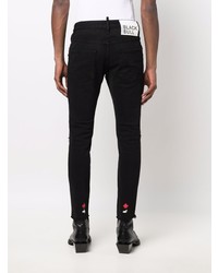 Мужские черные рваные зауженные джинсы от DSQUARED2